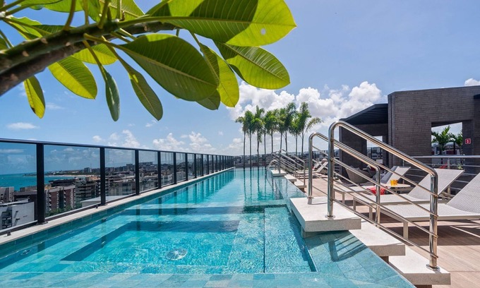 Centro Apartment | Top-Rated Edifício Time - Apto 916 with Pool & Spa