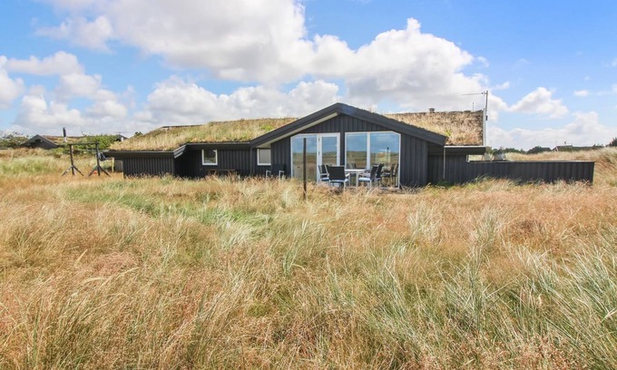 Blavand Strand House | Relax at Edyta: Oceanfront Retreat Steps from the Sea