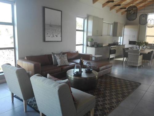 Kleinbaai Villa | EGRETS' ĂRK: Oceanfront Oasis with Private Beach Access