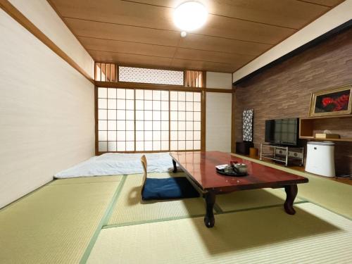 Amakusa Hotel | Discover Eimiya Ryokan: Family-Friendly Retreat with Hot Tub