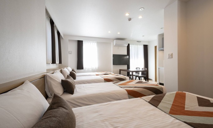 Toshima Hotel | Discover Eisei Stay: Eco-Friendly & Family-Friendly Escape