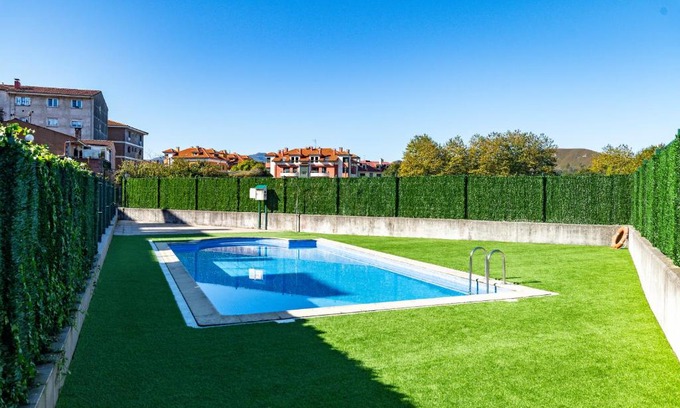 Posada de Llanes Apartment | El Brezo: Poolside Apartment Just 3km from the Beach