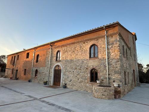 Fornells de la Selva House | Experience El Molí de Fornells: Family-Friendly Getaway