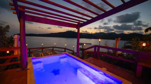 Punta Caribe Apartment | Cozy 2BR Beachfront Suite at El Palacio Rosa with Ocean Views