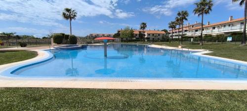 San Jorge Apartment | Unwind at Panorámica Golf Resort with Poolside Relaxation