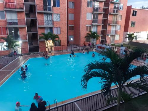 Melgar Apartment | Elegant Comfort and Poolside Relaxation Awaits You