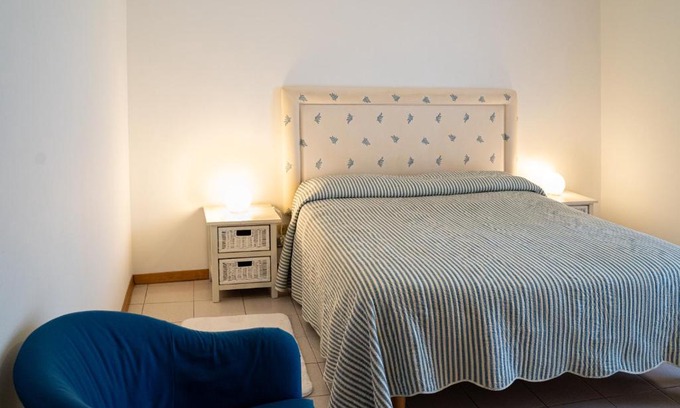 Capo Mulini Apartment | Elegant Oceanfront Apartment with Pool and Breakfast