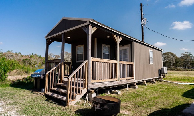Brazoria Cabin | Cozy Cabin with Stone Fireplace and Oceanfront Views