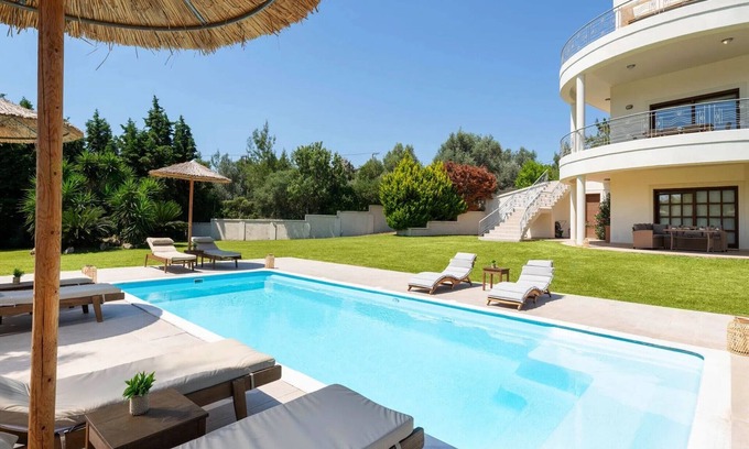 Asgourou Villa | Elegant Rhodes Villa | Villa Themis | 5 Bedrooms | Private Pool | Furnished Terrace | Modern Design and Stylish Amenities | Parking Area | Koskinou
