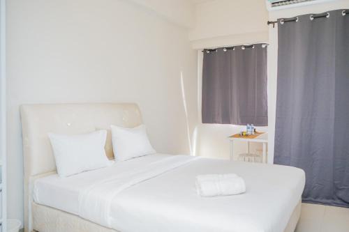 Serpong Apartment | Modern Studio at Parkland Avenue with Pool Access