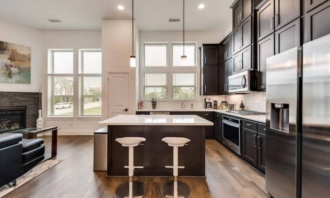 Lewisville House | Discover the Elegant Tech Oasis with Uplift Desk & Charger