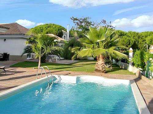 Nuevo Portil Villa | Cozy 3-Bedroom Villa Near Beach with Pool & Garden Access