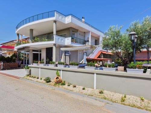 Olynthos Apartment | Oceanfront Eleon Studios - Rated 9.6, Family-Friendly Stay