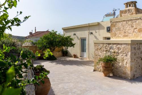 Platanos Apartment | Discover Eliana's Stone House – Family-Friendly Retreat