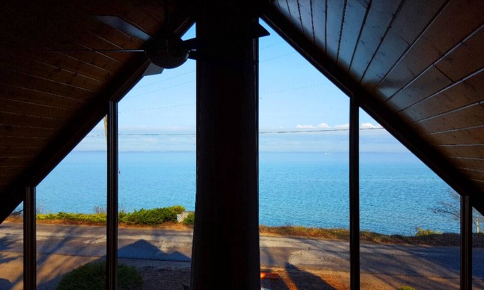 Traverse City Cabin | Unforgettable Elk Rapids Sunset Chalet with Ocean Views