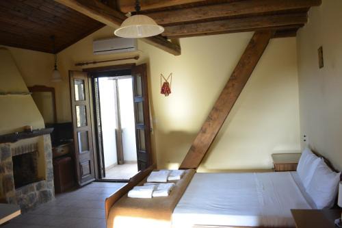 Kateriana Apartment | Experience Comfort at Ellinospito with Pool and Ocean Views