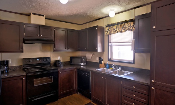 Carlsbad Cabin | Relaxing Stay at Ellipse Global Lodge: Pool & Spa Amenities