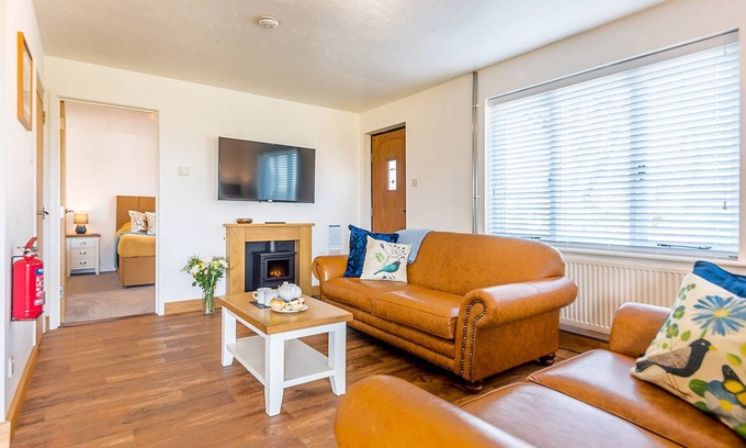 Otterham Cottage | Elm Cottage: Oceanfront Retreat with Pool & Pet-Friendly Perks