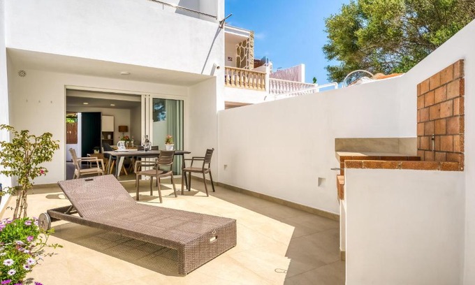 Cala Blanca Apartment | Child-Friendly Retreat at Els Arbocers 131-2, Rated 9.8