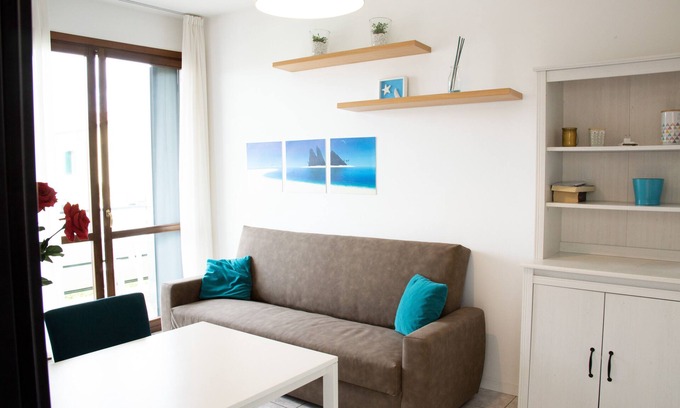 Ronchi Di Campanile Apartment | Relaxing Emerald Apartment Near the Sea with Pool Access