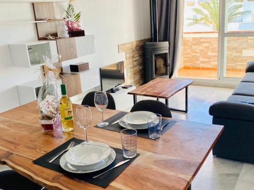 Retamar Apartment | Charming Penthouse with Fireplace and Pool in Almería