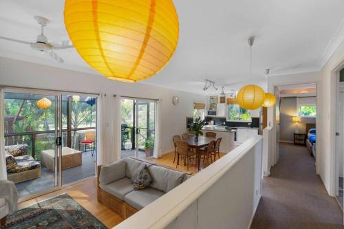 Brisbane Waterfront House | Magical Garden Cottage with Bikes for Family Getaways