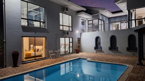 Oudtshoorn Apartment | Enchanting Poolside Retreat at 4-Star Enchanted Guests