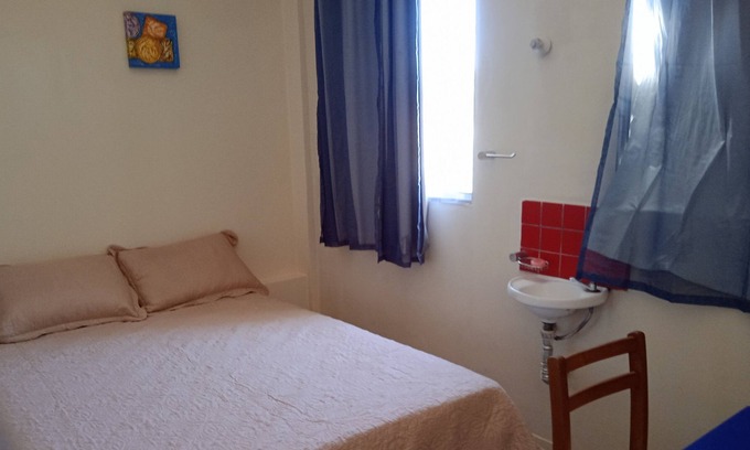 Pontal de Camburi Apartment | Delightful Retreat with Private Pool and Lake Views