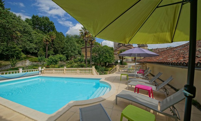 Riberac Villa | Inviting Mansion with Heated Pool and Peaceful Garden Oasis