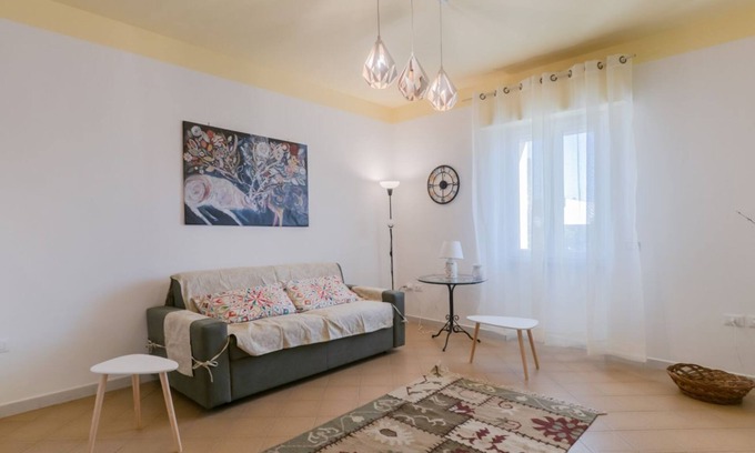 Squinzano Apartment | Cozy Domus Perrone Garden Yellow with Family-Friendly Amenities