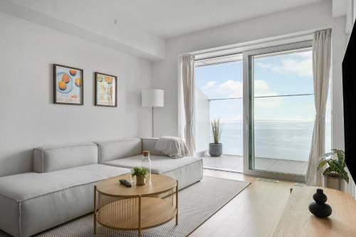 Aarhus C Apartment | Oceanfront Bliss with Private Balcony and Scenic Views