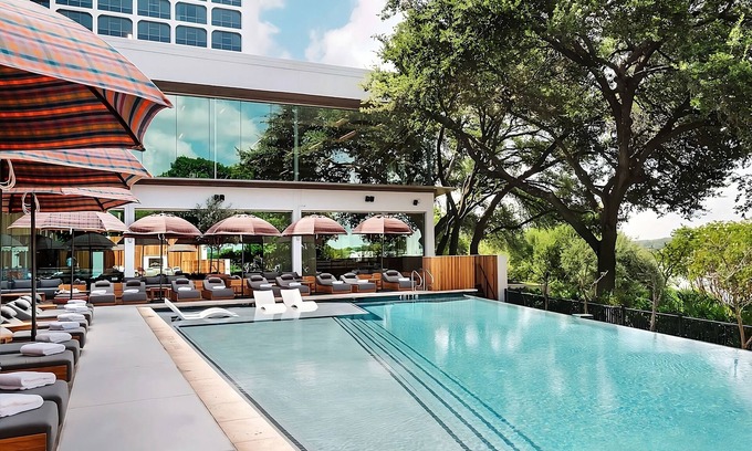 Congress Avenue Historic District Hotel | Experience a Relaxing Stay with Pool and Pet-Friendly Perks