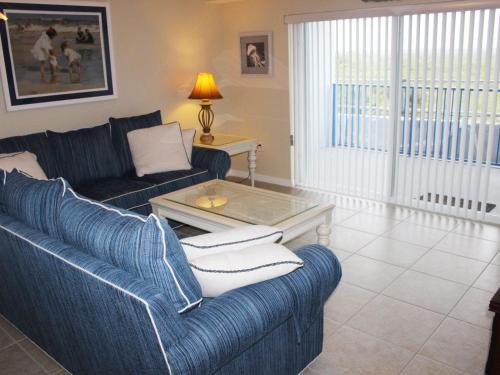 New Smyrna Beach Apartment | Experience Breathtaking Sunsets at Estuary Retreat OW10-403