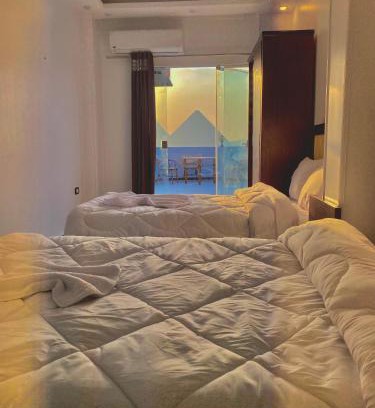 Al Haram House | Unforgettable Stays at Golden Pyramids with Breakfast & More