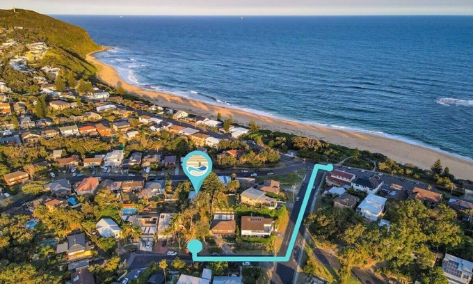 Forresters Beach House | Relax on the Seabreezing Deck with Oceanfront Views