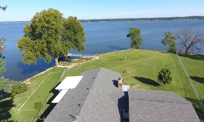 Grove House | Experience Enchanting Sunsets at Lakefront 2 BR Home