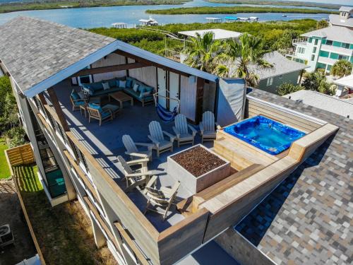 Bethune Beach House | Unwind by the Riverfront Pool at Redfish Dance Home