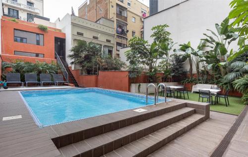 la Vila de Gracia Apartment | Relax at Enjoybcn Patio de Gracia: Pet-Friendly & Poolside