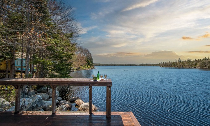 Halifax County Cottage | Inviting Lake Home with Private Dock & Hot Tub - Pet Friendly