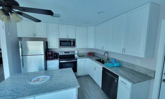 Lake Worth House | Inviting 4-Bedroom Home with Pool and Spacious Backyard
