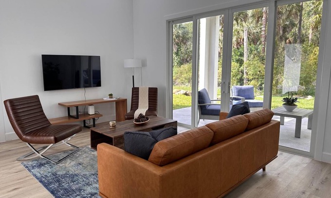 Rural Estates House | Modern Oceanfront Home in Naples with Spa & Hot Tub