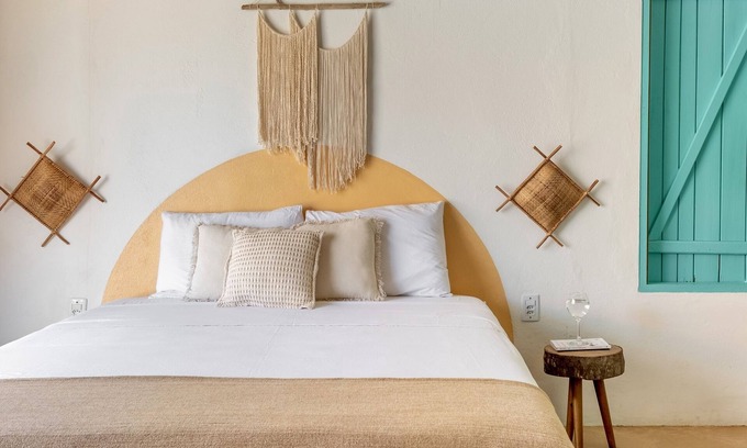 Corumbau House | Cozy Coral Bungalow: Steps from the Beach with Ocean Views