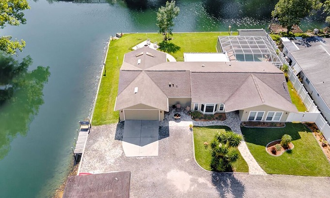 Weeki Wachee Gardens House | Bright and Inviting Home with Private Pool and Pet Friendly