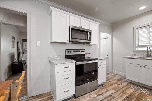 West Valley City House | Cozy Small House with Large Yard - Pets Welcome Here!