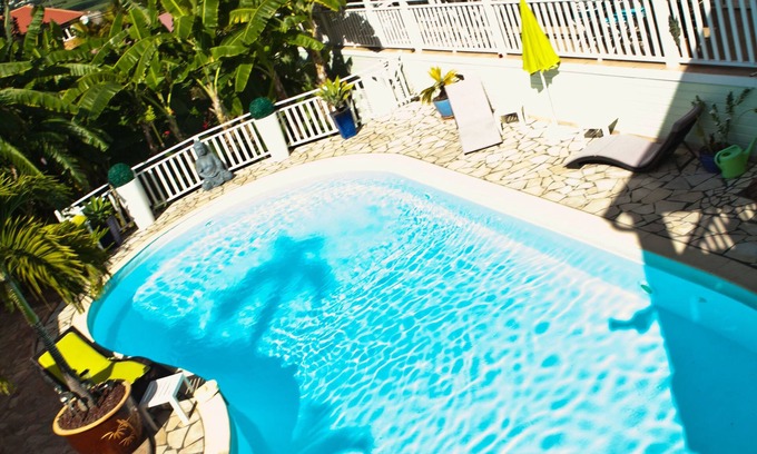 Entre-Deux House | Discover Entre Deux Rêves: Pool, Spa & Dining Awaits!