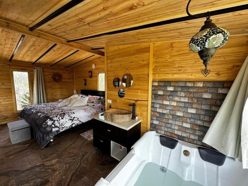 Boyaca Other | Relax at Entre Hayuelos with Inviting Hot Tub Amenities