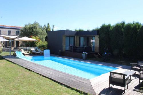 Tonnay-Charente Villa | Seaside Getaway at Entre Piscine et Mer, Guest Rated 9.8