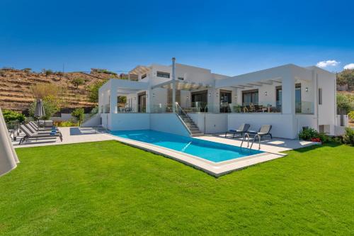 Panormos Villa | Iconic Eolia Villa: Oceanfront Bliss Steps from the Beach