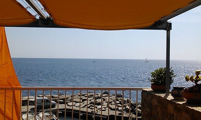 Erbalunga Apartment | Erbalunga Brando: Oceanfront Apartment with Scenic Terrace
