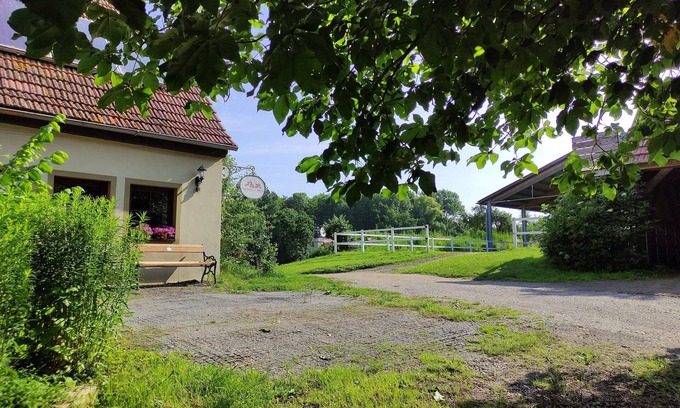 Wiesentheid Apartment | Exceptional Erdhausapartment West with Pool and Lake Views